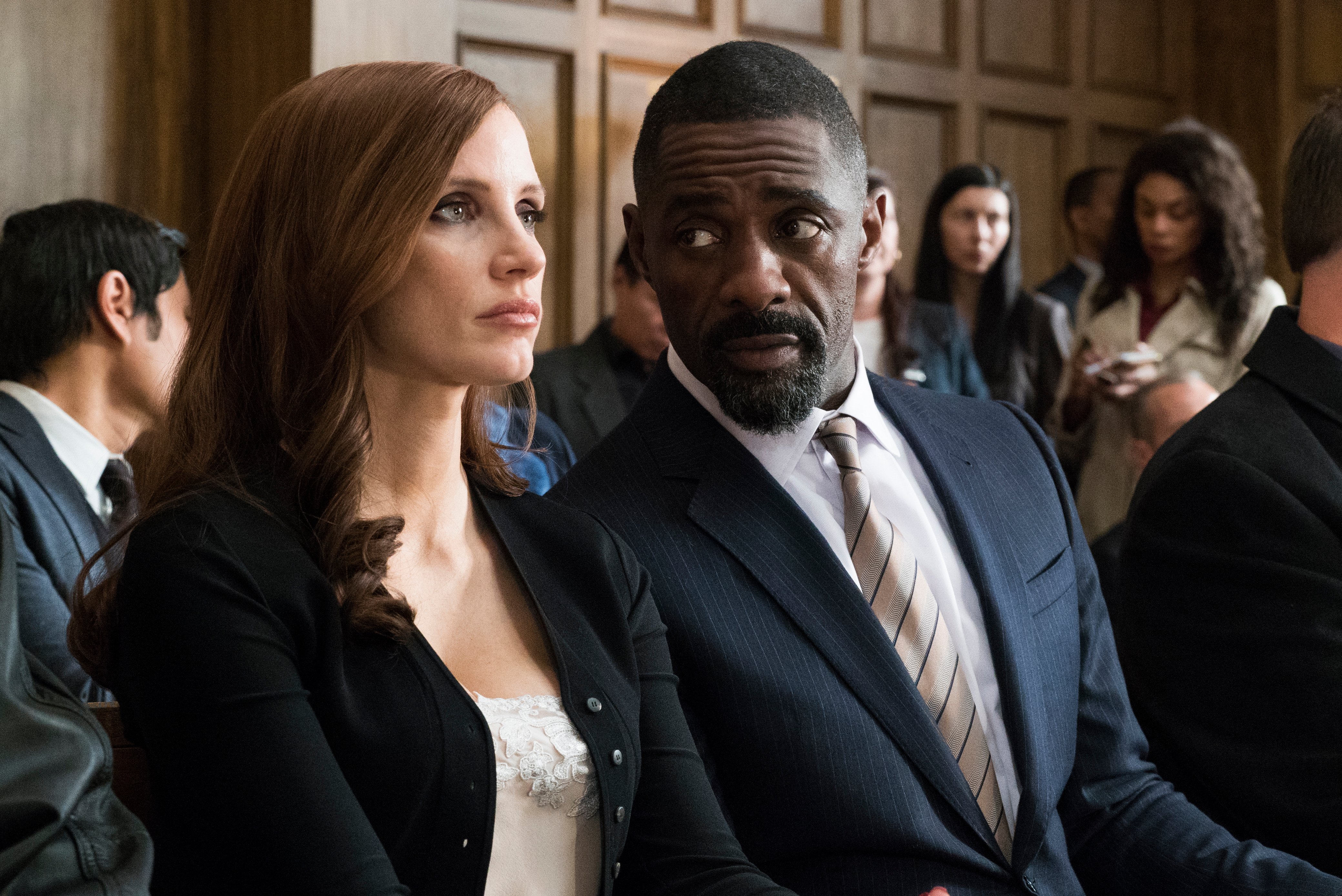 MollysGame_JessicaChastain_IdrisElba_1.jpg