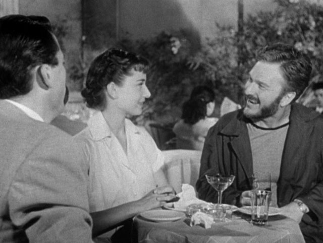 Gregory_Peck_Audrey_Hepburn_and_Eddie_Albert_in_Roman_Holiday_trailer.jpg